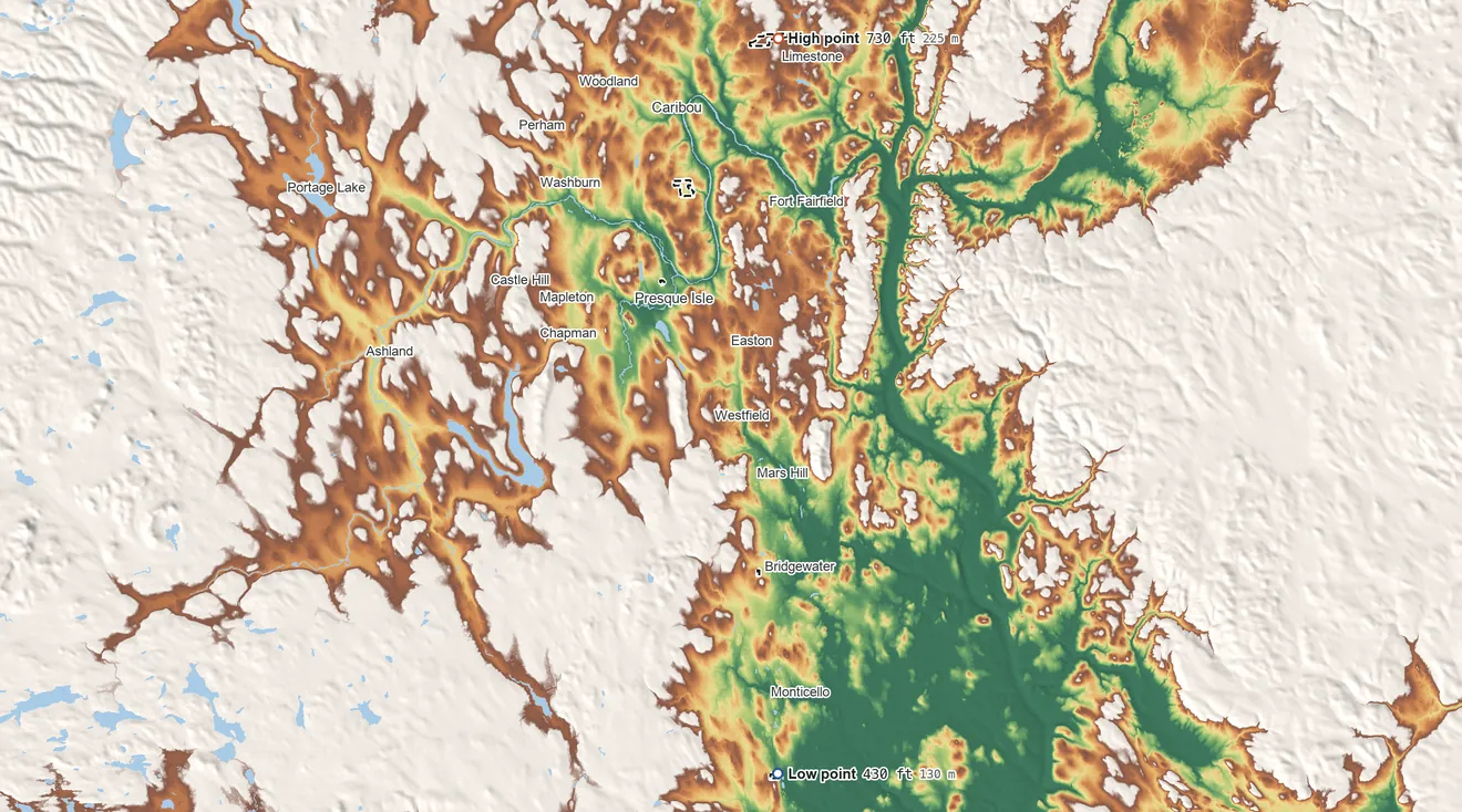 Topographic elevation map of Aroostook Band of Micmac Trust Land, Maine, shaded from 430 ft on the south side to 730 ft on the north side