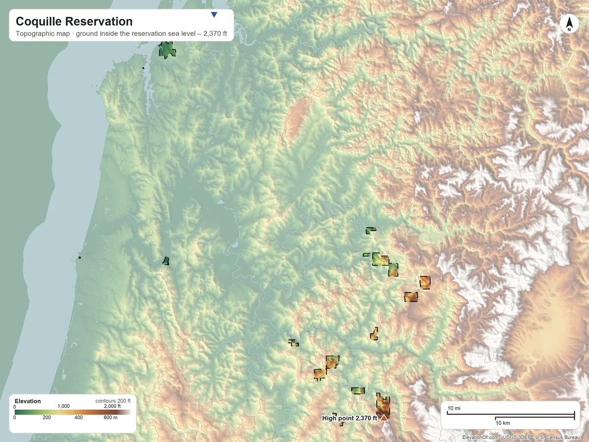 Topographic elevation map of Coquille Reservation, Oregon, shaded from sea level on Coos Bay to 2,370 ft on the southeast side