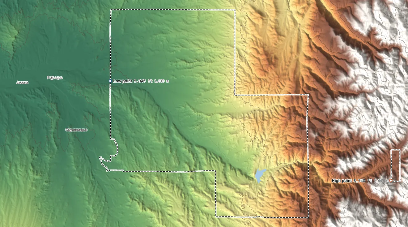 Topographic elevation map of Nambe Pueblo, New Mexico, shaded from 5,940 ft on the west side to 8,740 ft on the east side