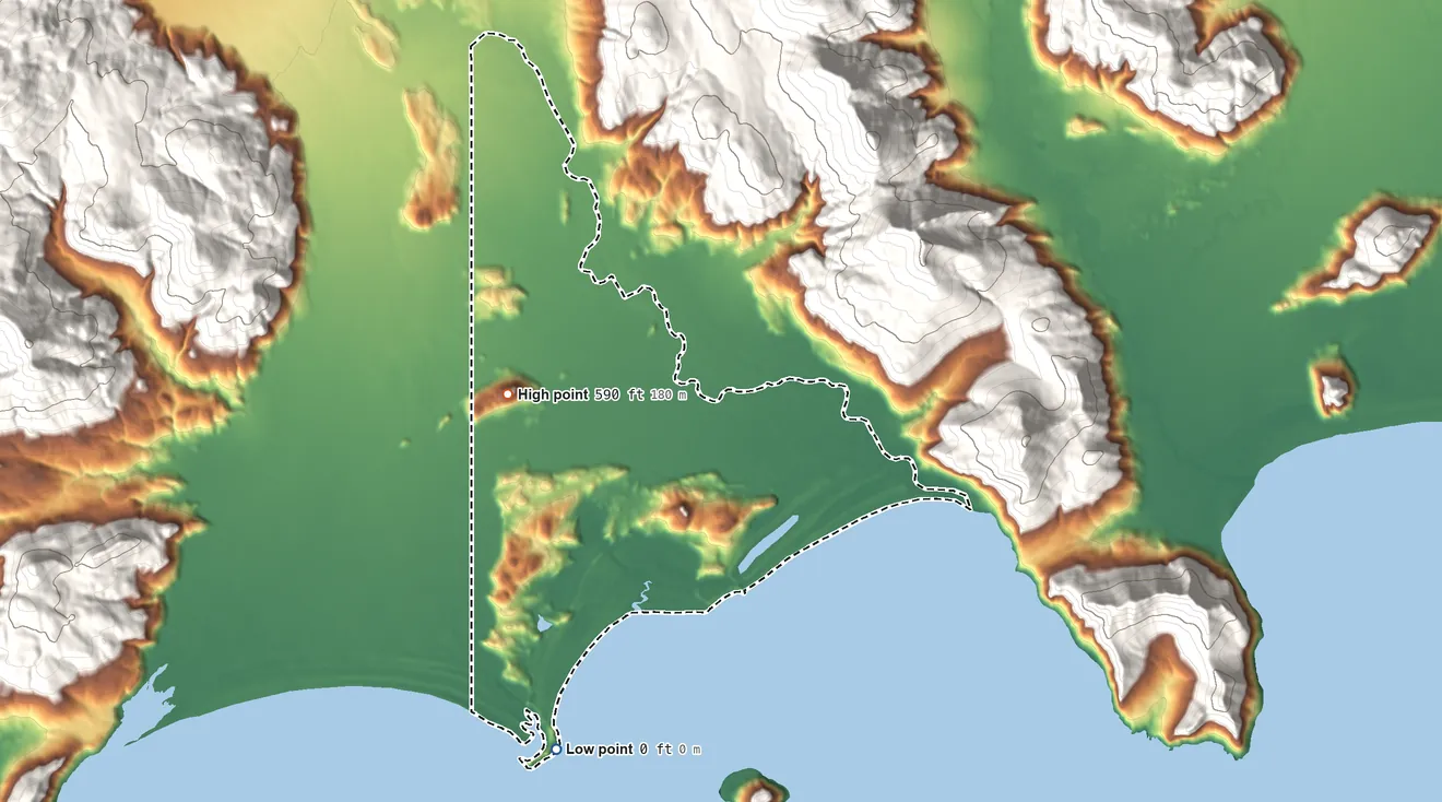 Topographic elevation map of Perryville ANVSA, Alaska, shaded from sea level on the Pacific Ocean to 590 ft on the west side