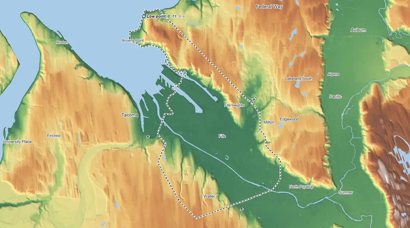 Topographic elevation map of Puyallup Reservation, Washington, shaded from sea level on Puget Sound to 720 ft on the southeast side