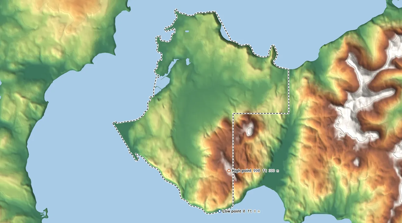 Topographic elevation map of Sand Point ANVSA, Alaska, shaded from sea level on the Popof Strait to 990 ft on the southeast side