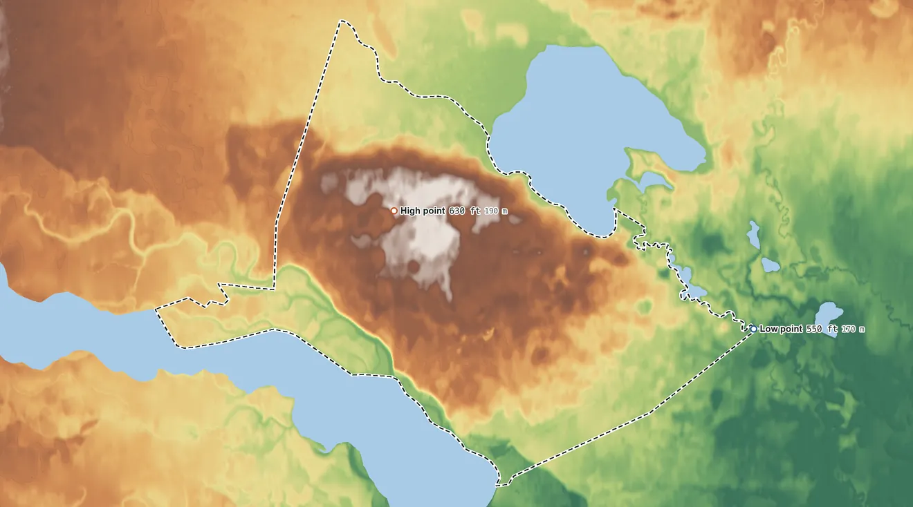 Topographic elevation map of Venetie ANVSA, Alaska, shaded from 550 ft on the east side to 630 ft near the middle