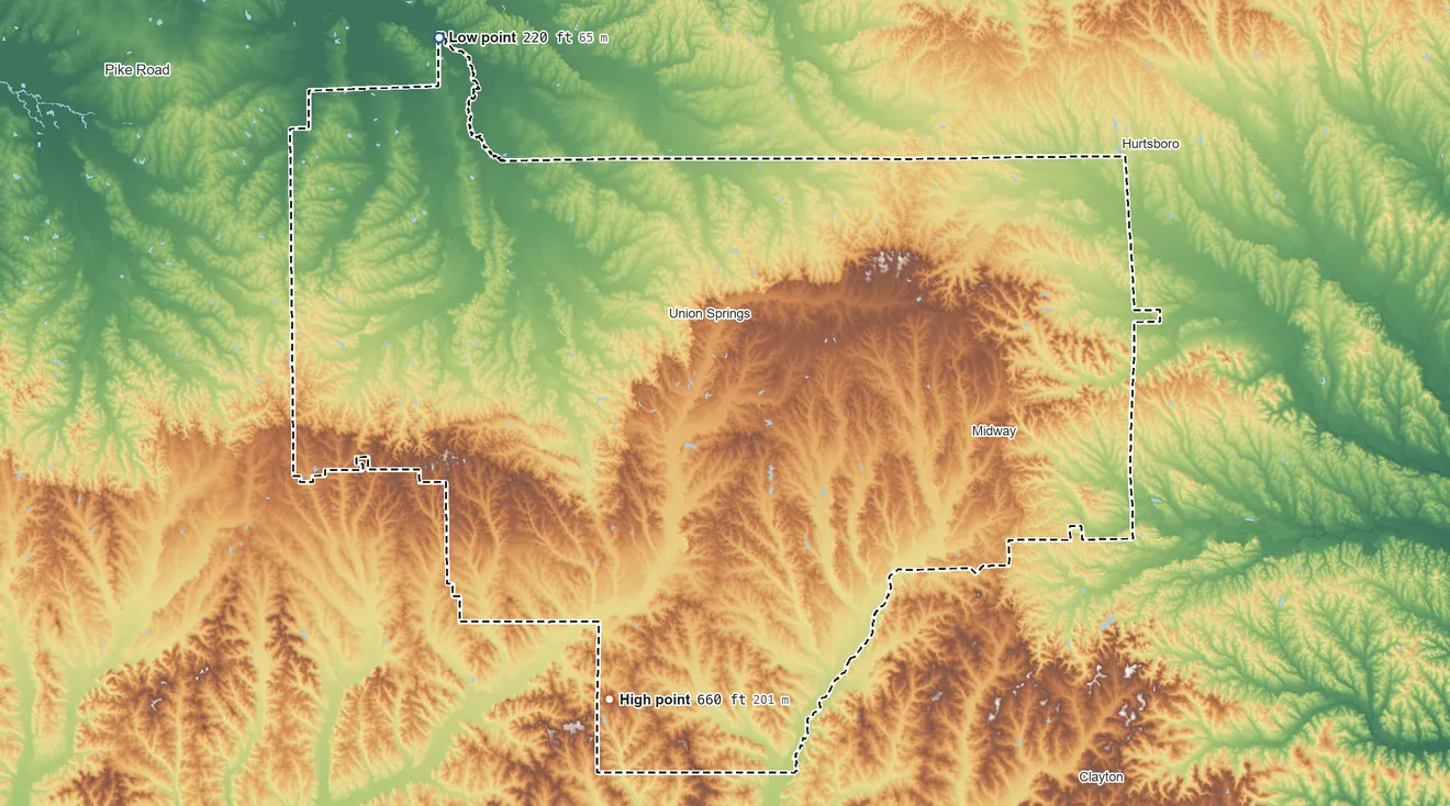 Topographic elevation map of Bullock County, Alabama, shaded from 220 ft on the northwest side to 660 ft on Wolfpit Hill