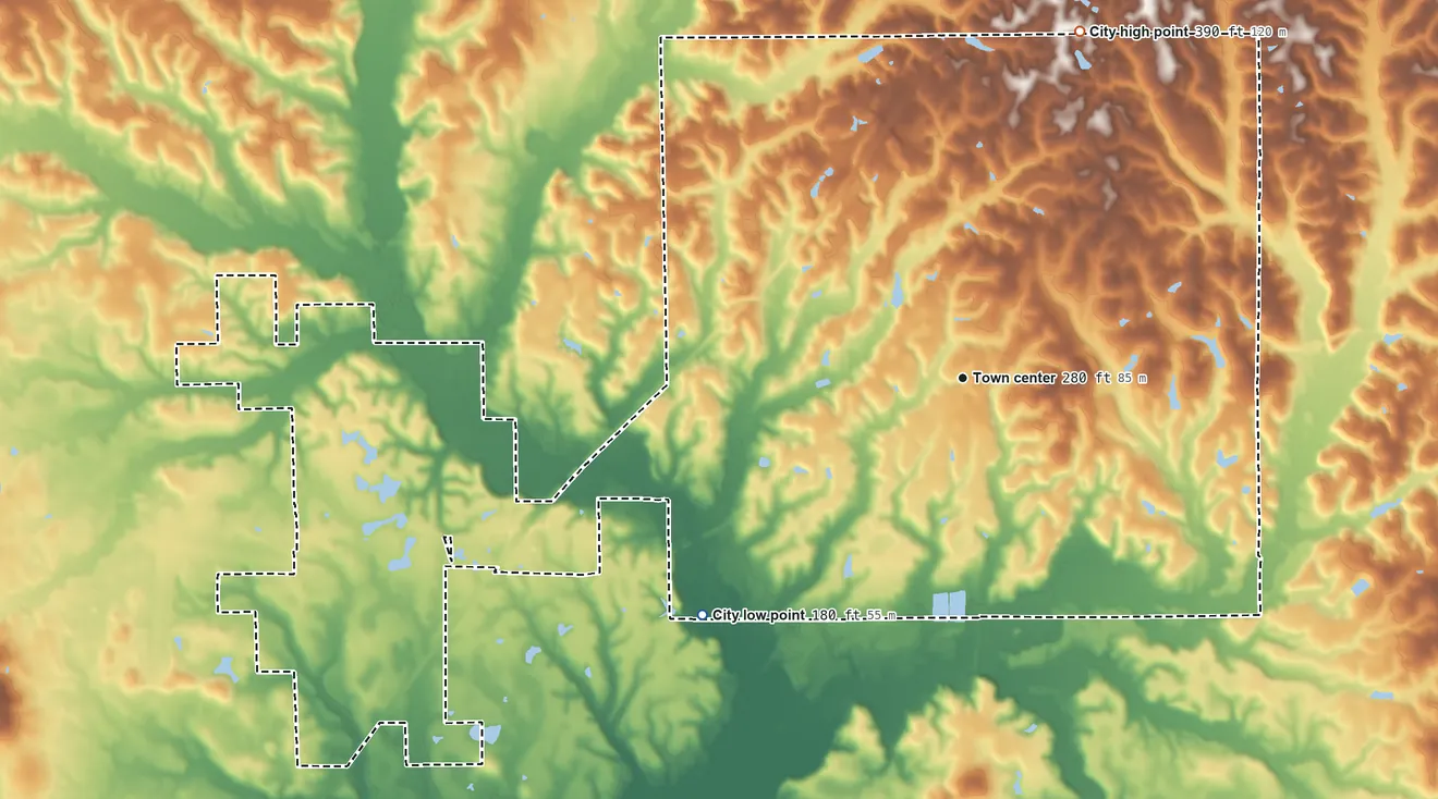 Topographic elevation map of Evergreen, Alabama, shaded from 180 ft on the southwest side to 390 ft on the north side