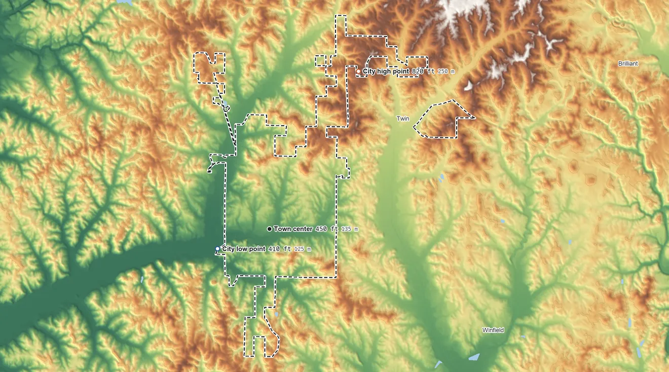 Topographic elevation map of Guin, Alabama, shaded from 410 ft on the west side to 820 ft on the northeast side