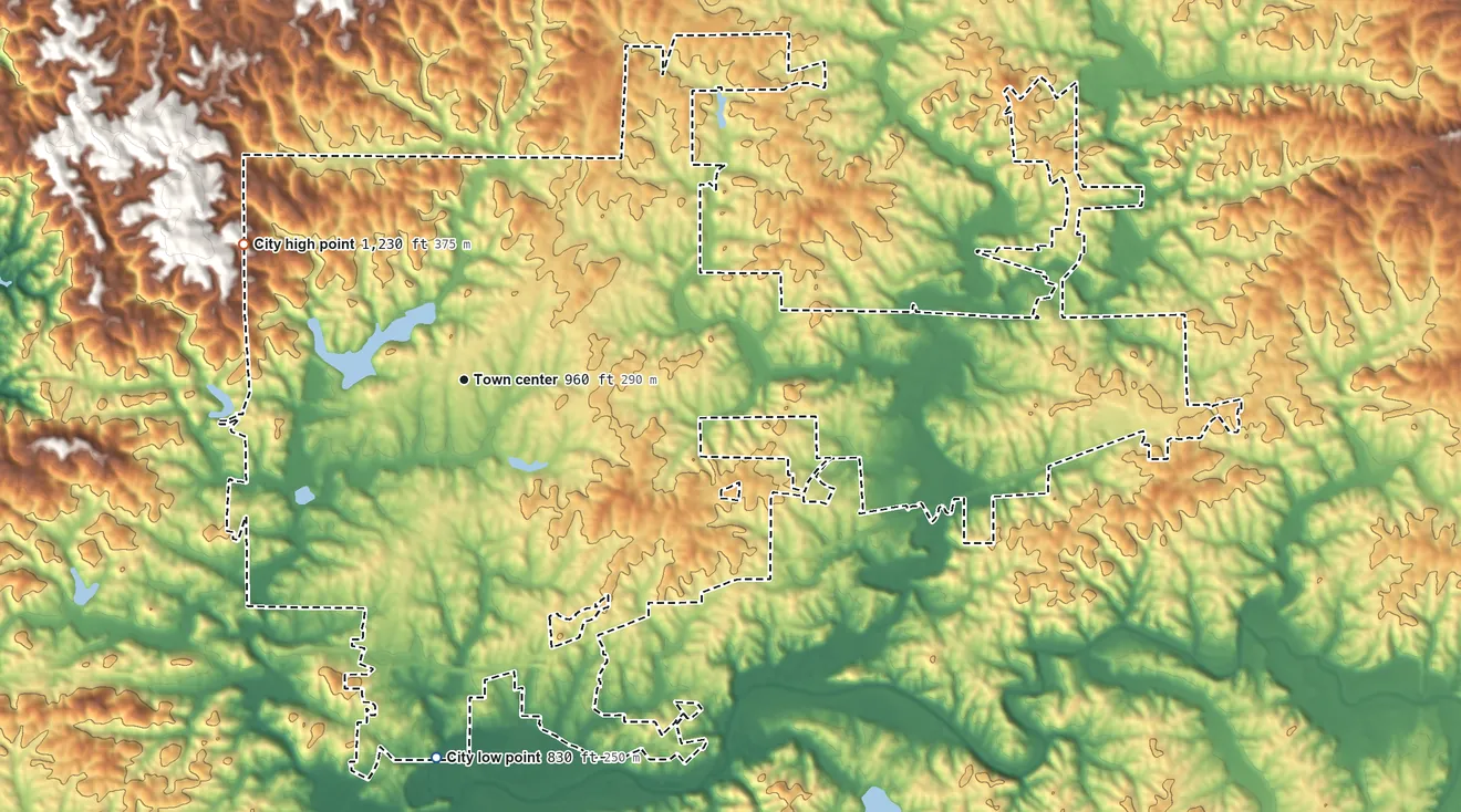 Topographic elevation map of Heflin, Alabama, shaded from 830 ft on the south side to 1,230 ft on the northwest side