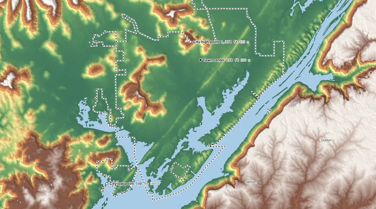 Topographic elevation map of Scottsboro, Alabama, shaded from 590 ft on the southwest side to 1,370 ft near the middle