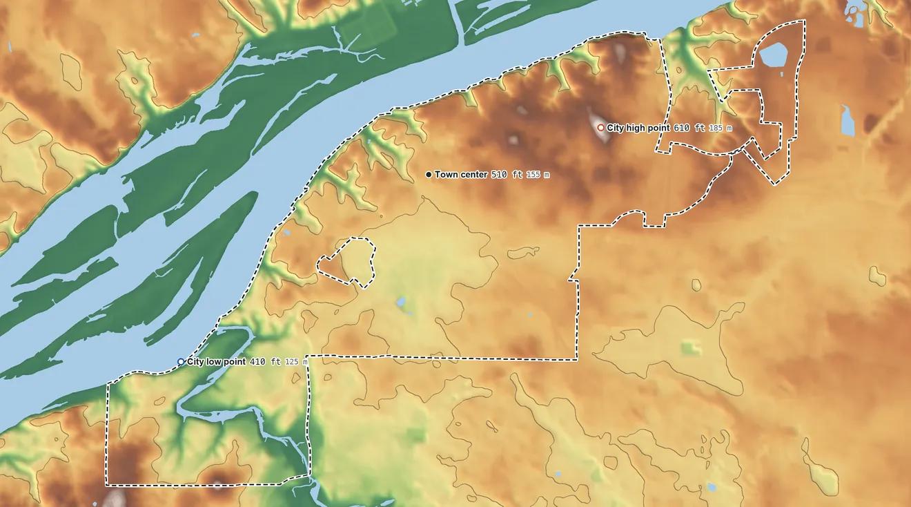 Topographic elevation map of Sheffield, Alabama, shaded from 410 ft on the southwest side to 610 ft on the east side