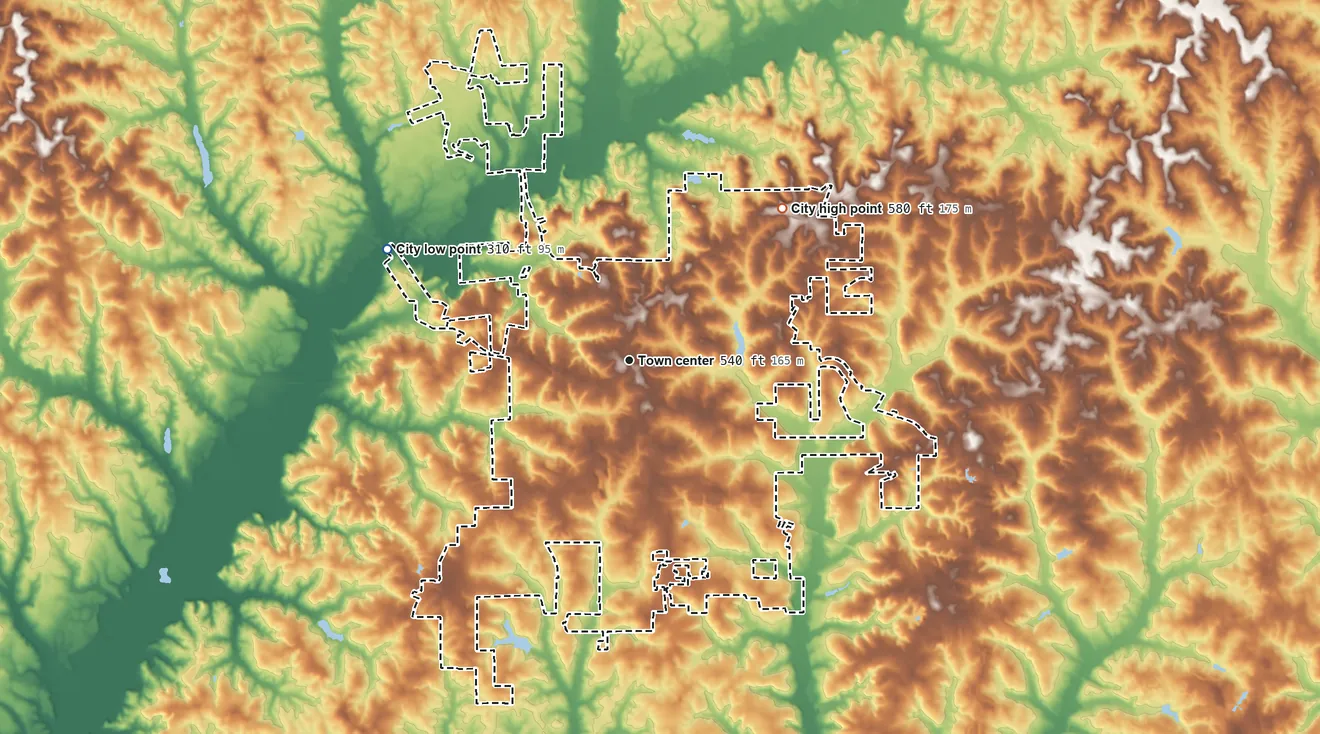 Topographic elevation map of Troy, Alabama, shaded from 310 ft on the northwest side to 580 ft on the northeast side