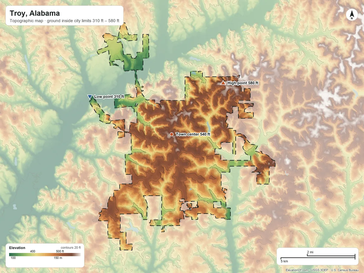 Topographic elevation map of Troy, Alabama, shaded from 310 ft on the northwest side to 580 ft on the northeast side