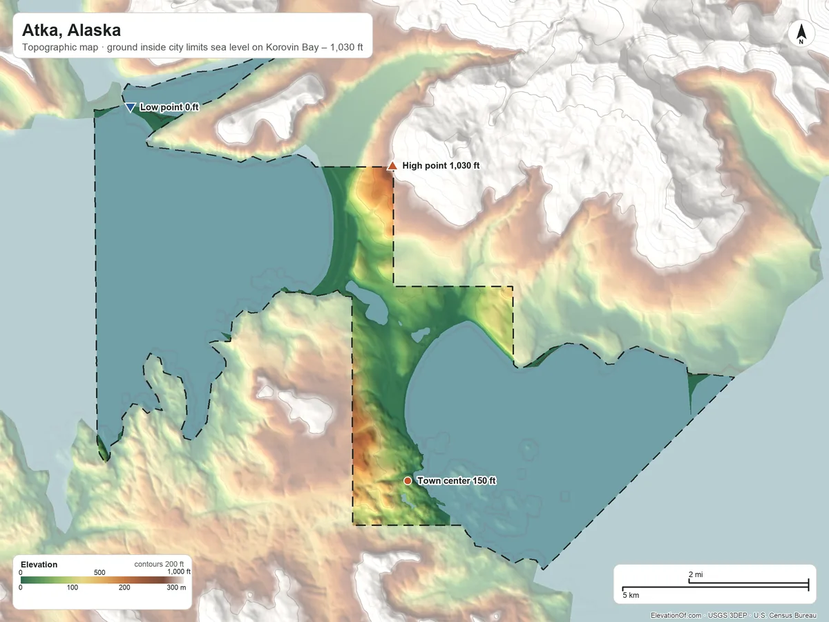 Topographic elevation map of Atka, Alaska, shaded from sea level level on Korovin Bay to 1,030 ft on the north edge, below higher ground just outside