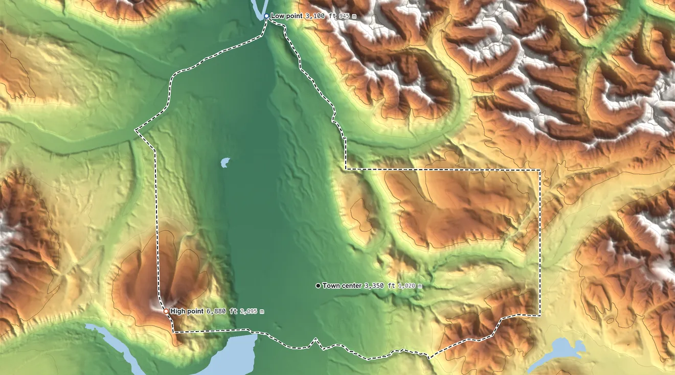 Topographic elevation map of Chisana, Alaska, shaded from 3,100 ft on the north side to 6,878 ft on Euchre Mountain