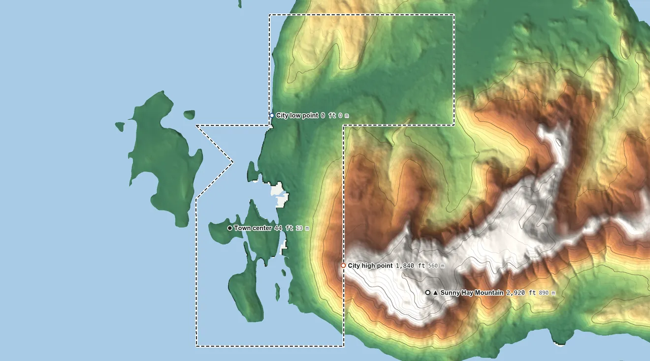 Topographic elevation map of Craig, Alaska, shaded from sea level level on Klawock Inlet to 1,840 ft on the east edge, below higher ground just outside