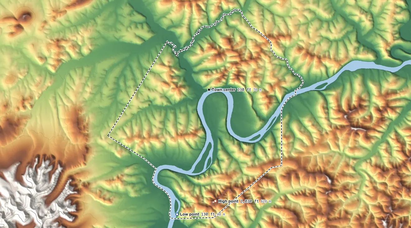 Topographic elevation map of Crooked Creek, Alaska, shaded from 130 ft on the south side to 2,030 ft on Canoe Mountain