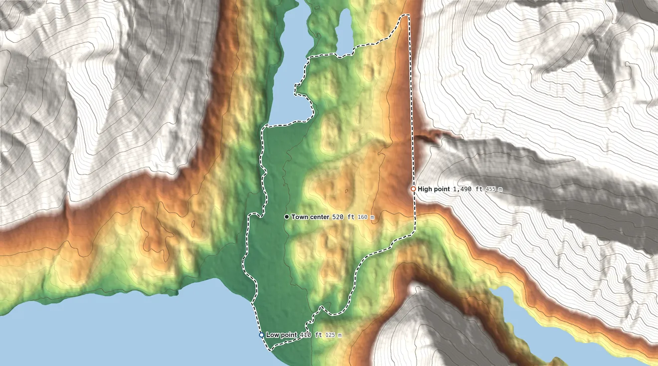 Topographic elevation map of Crown Point, Alaska, shaded from 410 ft on the south side to 1,490 ft on the east edge, below higher ground just outside
