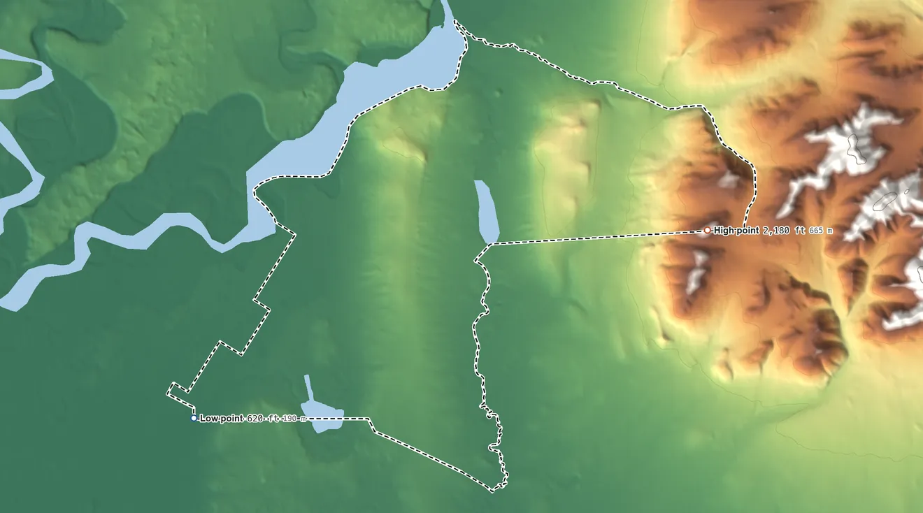 Topographic elevation map of Evansville, Alaska, shaded from 620 ft on the south side to 2,180 ft on the east side