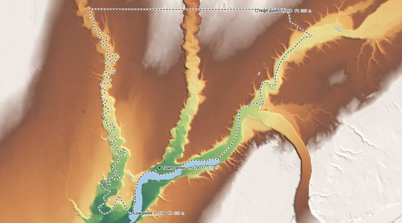 Topographic elevation map of Gakona, Alaska, shaded from 1,370 ft on the southwest side to 1,940 ft on the northeast side