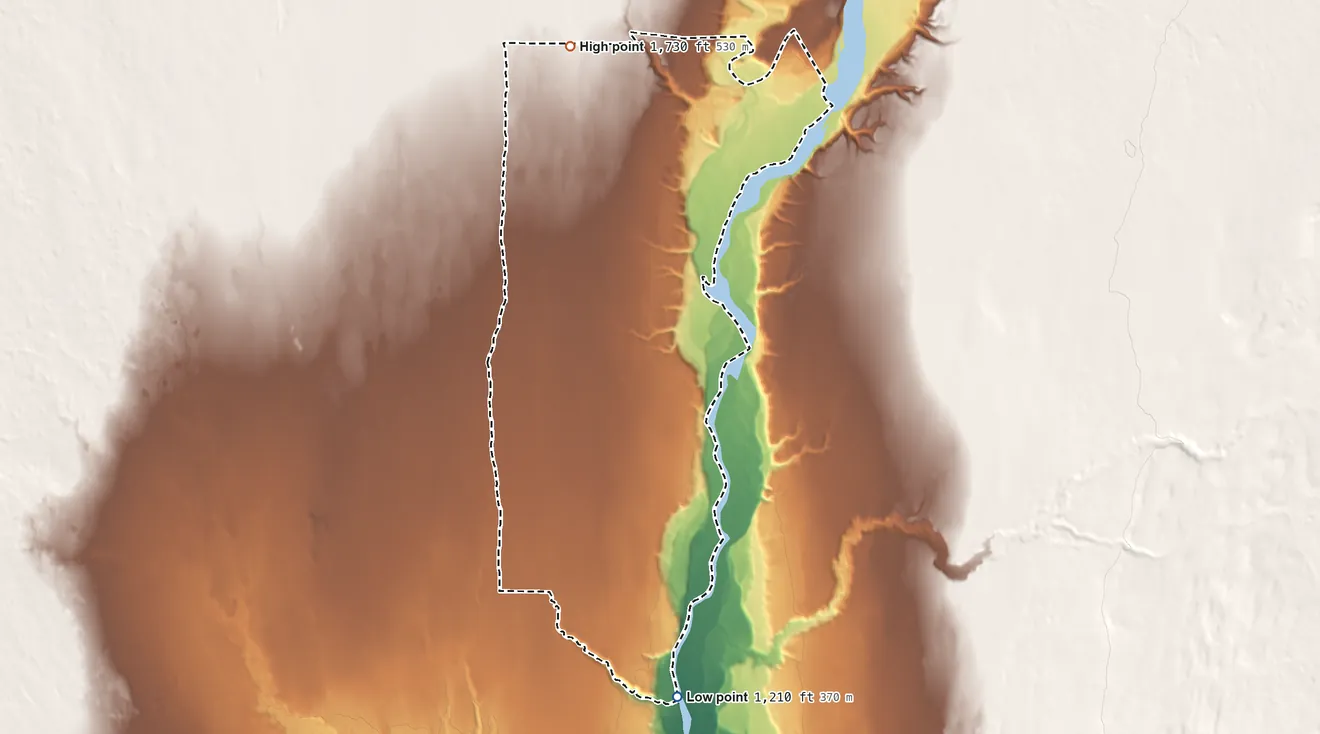 Topographic elevation map of Gulkana, Alaska, shaded from 1,210 ft on the south side to 1,730 ft on the northwest side