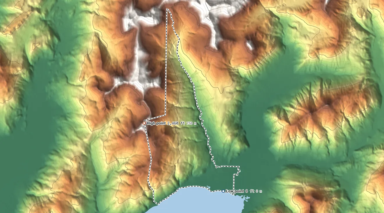 Topographic elevation map of Ivanof Bay, Alaska, shaded from sea level level on Ivanof Bay to 2,460 ft on the west edge, below higher ground just outside