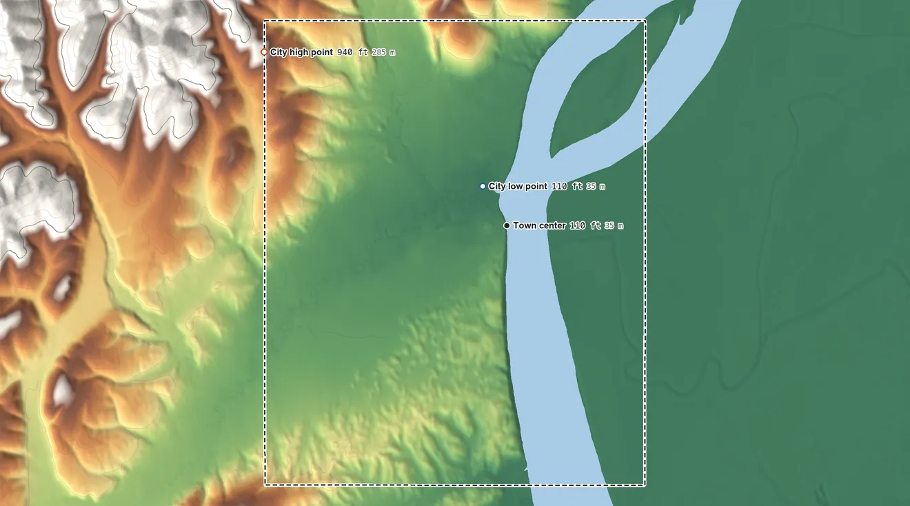 Topographic elevation map of Kaltag, Alaska, shaded from 110 ft near the middle to 940 ft on the northwest edge, below higher ground just outside