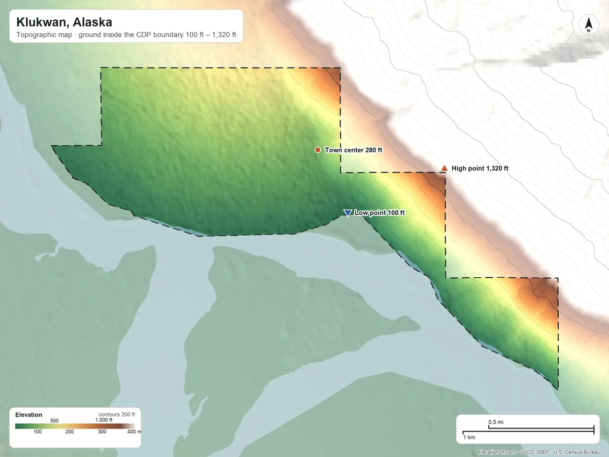 Topographic elevation map of Klukwan, Alaska, shaded from 100 ft on the southeast side to 1,320 ft at the foot of the Takshanuk Mountains