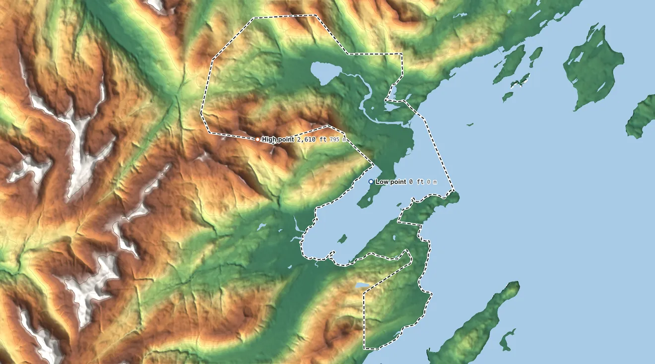 Topographic elevation map of Kodiak Station, Alaska, shaded from sea level level on Womens Bay to 2,610 ft on Erskine Mountain