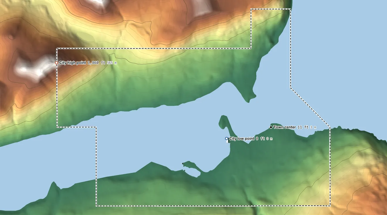 Topographic elevation map of Larsen Bay, Alaska, shaded from sea level level on Larsen Bay to 1,860 ft on the west edge, below higher ground just outside