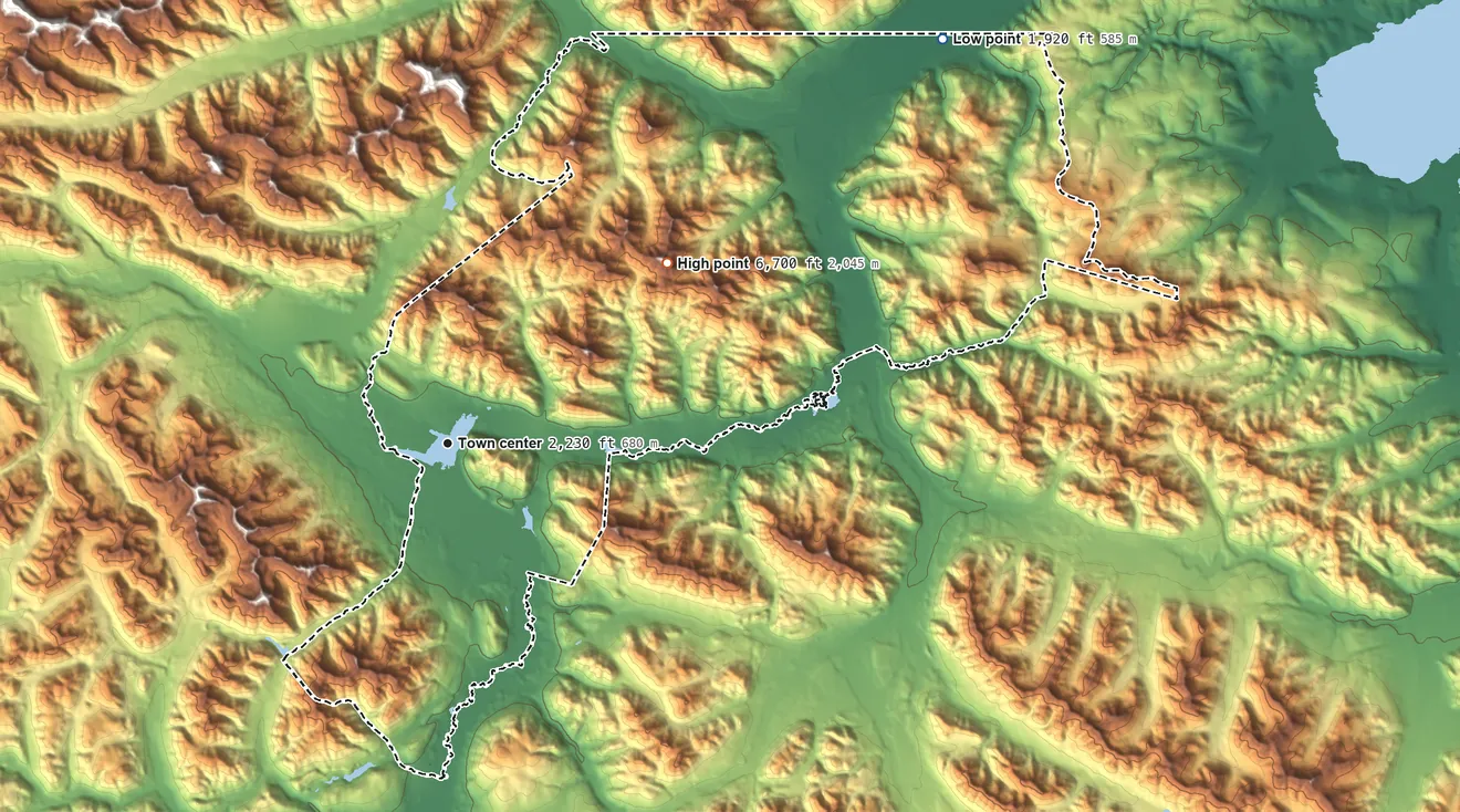 Topographic elevation map of Mentasta Lake, Alaska, shaded from 1,920 ft on the northeast side to 6,700 ft on the northeast side