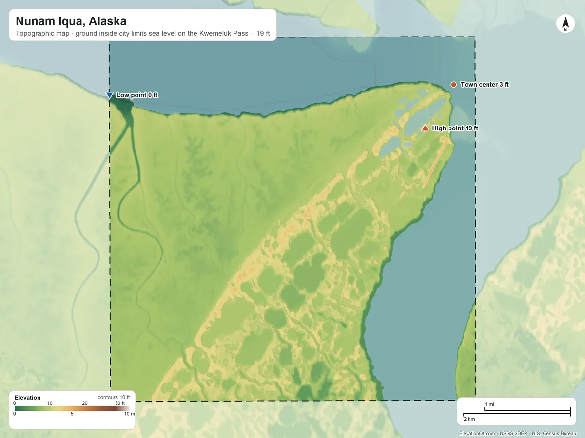 Topographic elevation map of Nunam Iqua, Alaska, shaded from sea level level on the Kwemeluk Pass to 19 ft on the southwest side