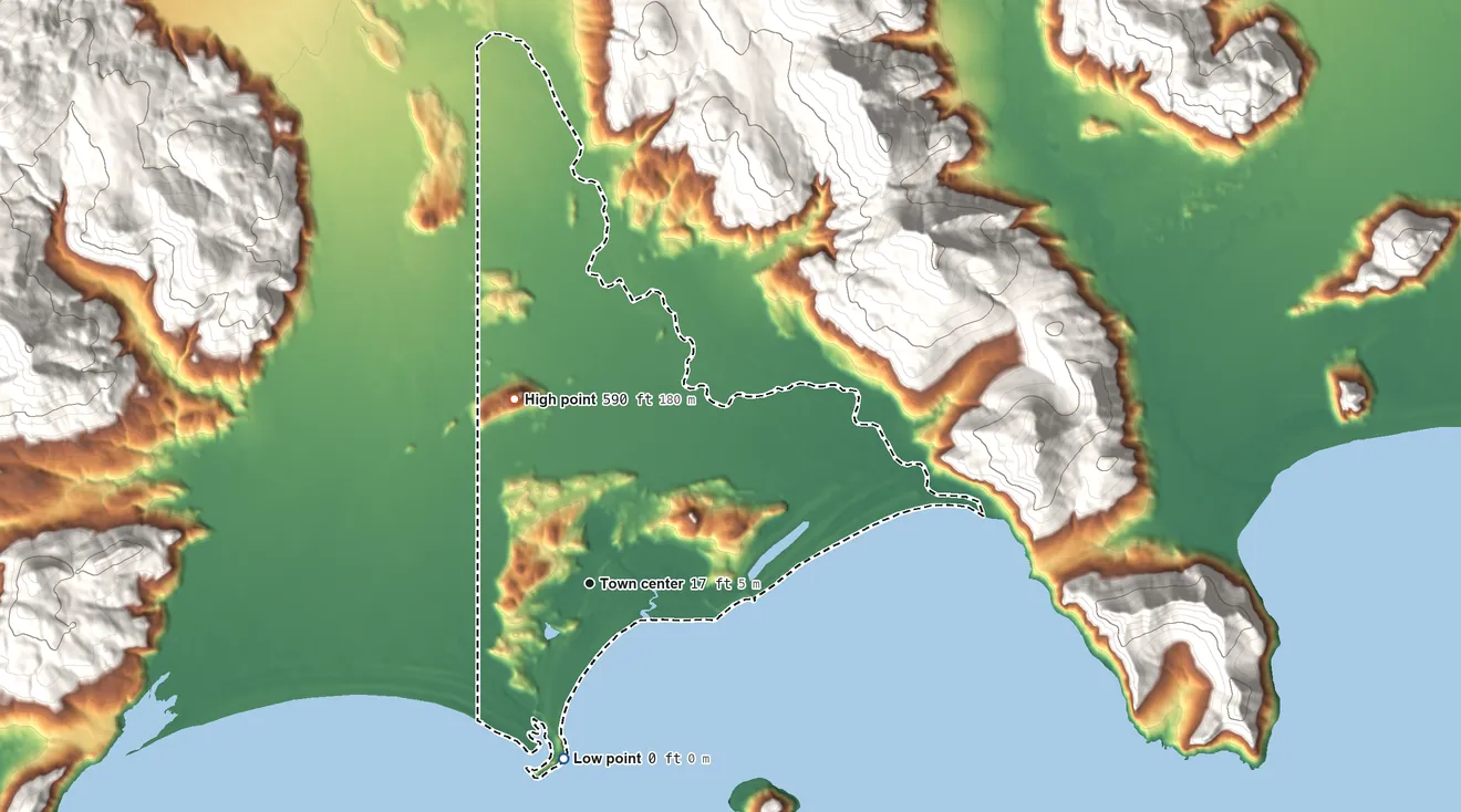 Topographic elevation map of Perryville, Alaska, shaded from sea level level on the Pacific Ocean to 590 ft on the north side