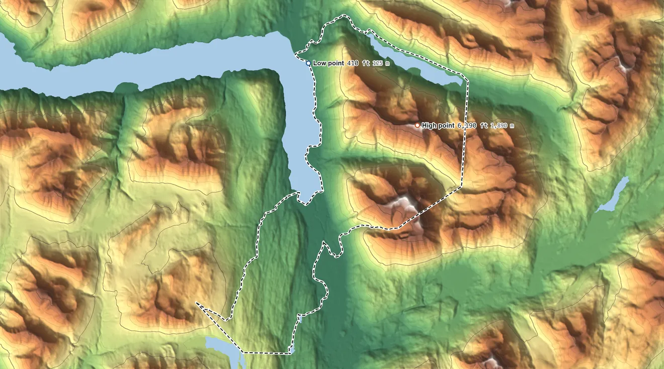 Topographic elevation map of Primrose, Alaska, shaded from 410 ft on the north side to 6,190 ft on Andy Simons Mountain
