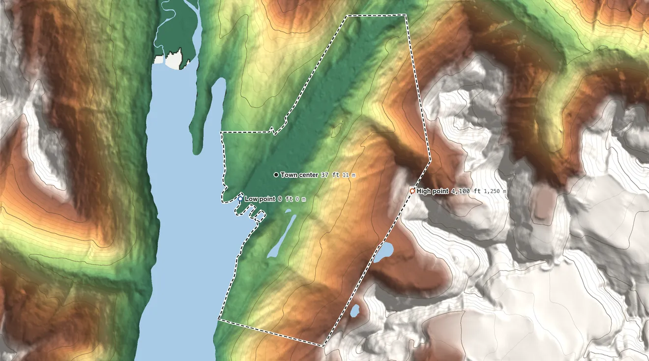 Topographic elevation map of Skagway, Alaska, shaded from sea level level on Taiya Inlet to 4,100 ft on the east edge, below higher ground just outside