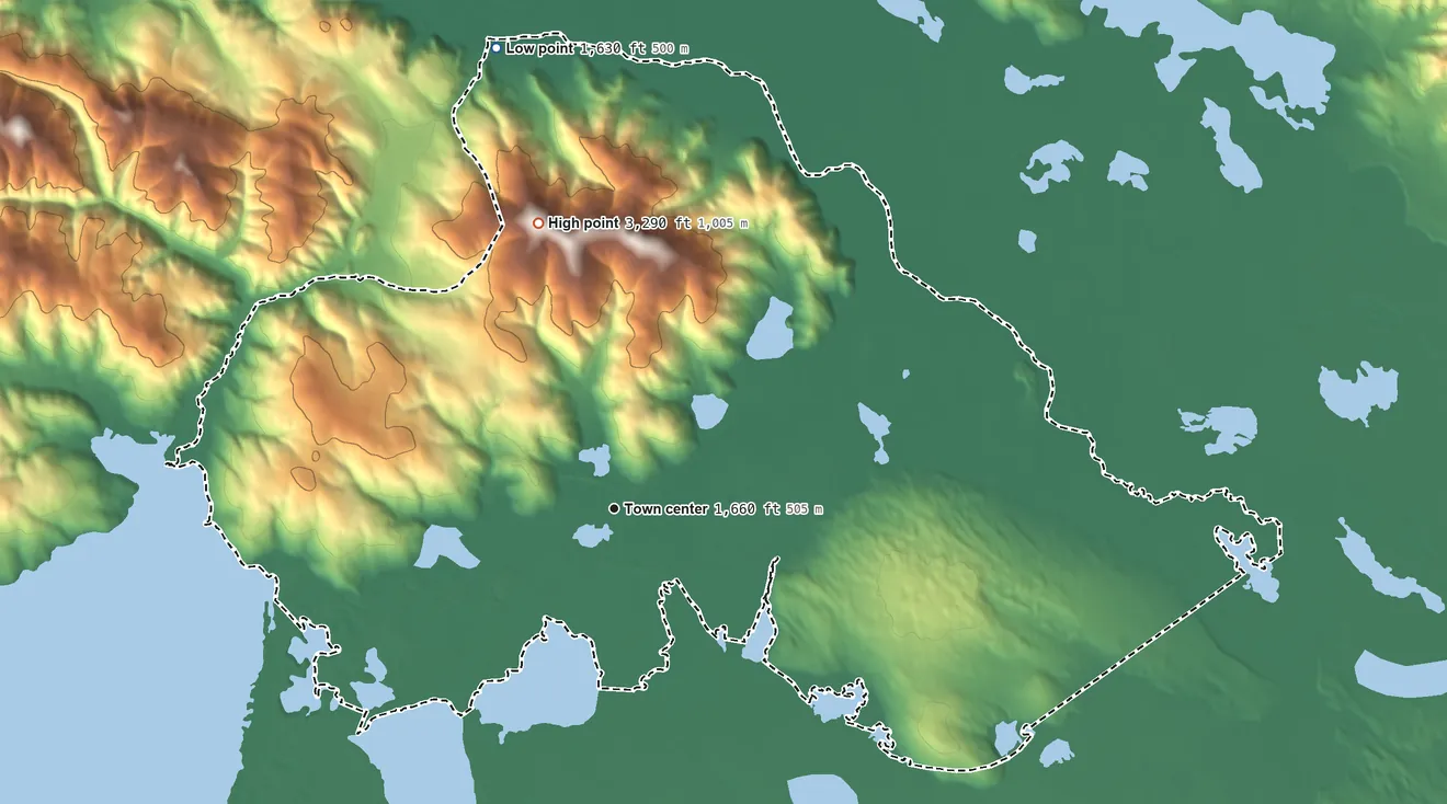 Topographic elevation map of Tetlin, Alaska, shaded from 1,630 ft on the north side to 3,290 ft on Chisana Mountain