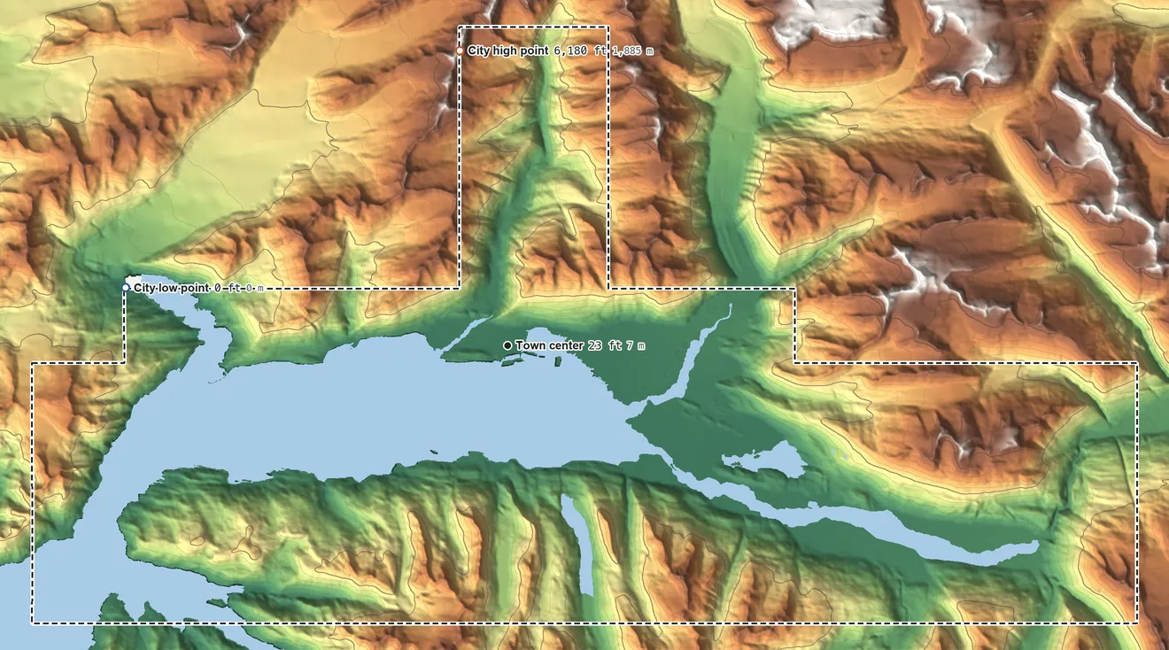 Topographic elevation map of Valdez, Alaska, shaded from sea level level on the Port Valdez to 6,180 ft on the north side