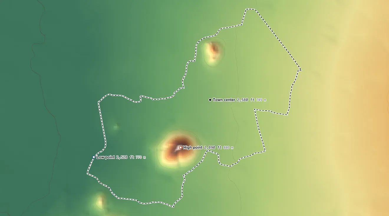 Topographic elevation map of Ali Chukson, Arizona, shaded from 2,520 ft on the southwest side to 2,890 ft on Ali Chukson