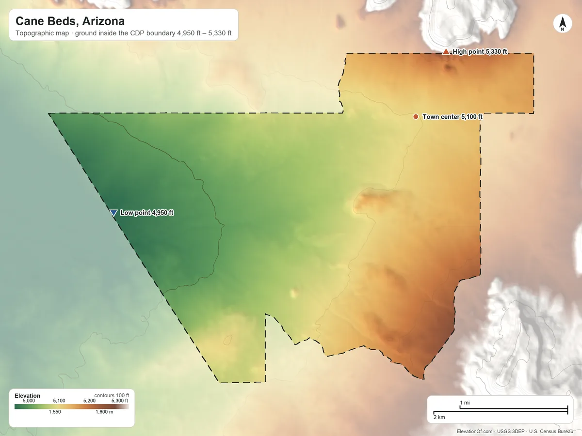 Topographic elevation map of Cane Beds, Arizona, shaded from 4,950 ft on the west side to 5,330 ft at the foot of the Moccasin Mountains