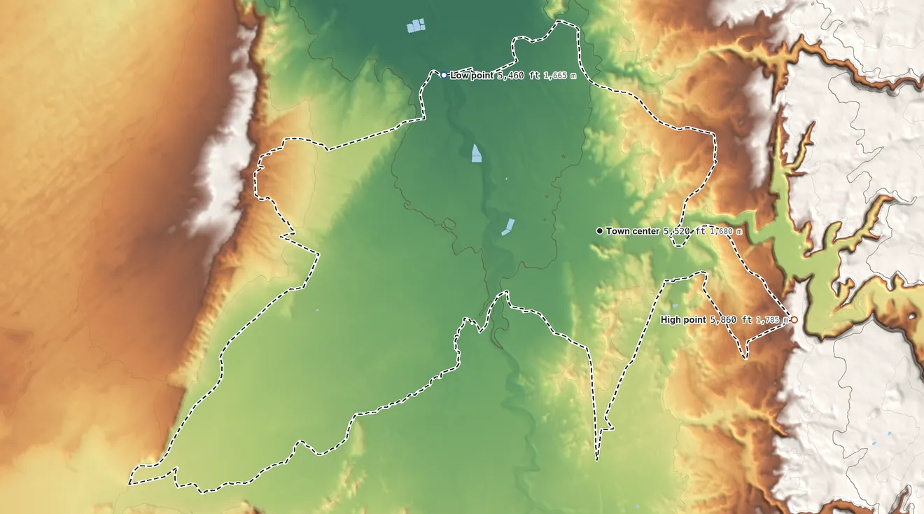 Topographic elevation map of Chinle, Arizona, shaded from 5,460 ft on the northwest side to 5,860 ft on the southeast side