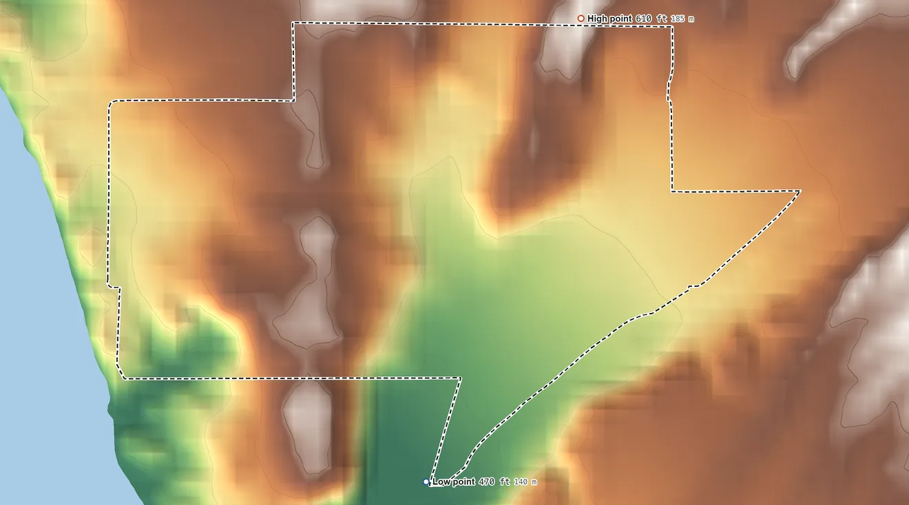 Topographic elevation map of Crystal Beach, Arizona, shaded from 470 ft on the south side to 610 ft at the foot of the Mohave Mountains