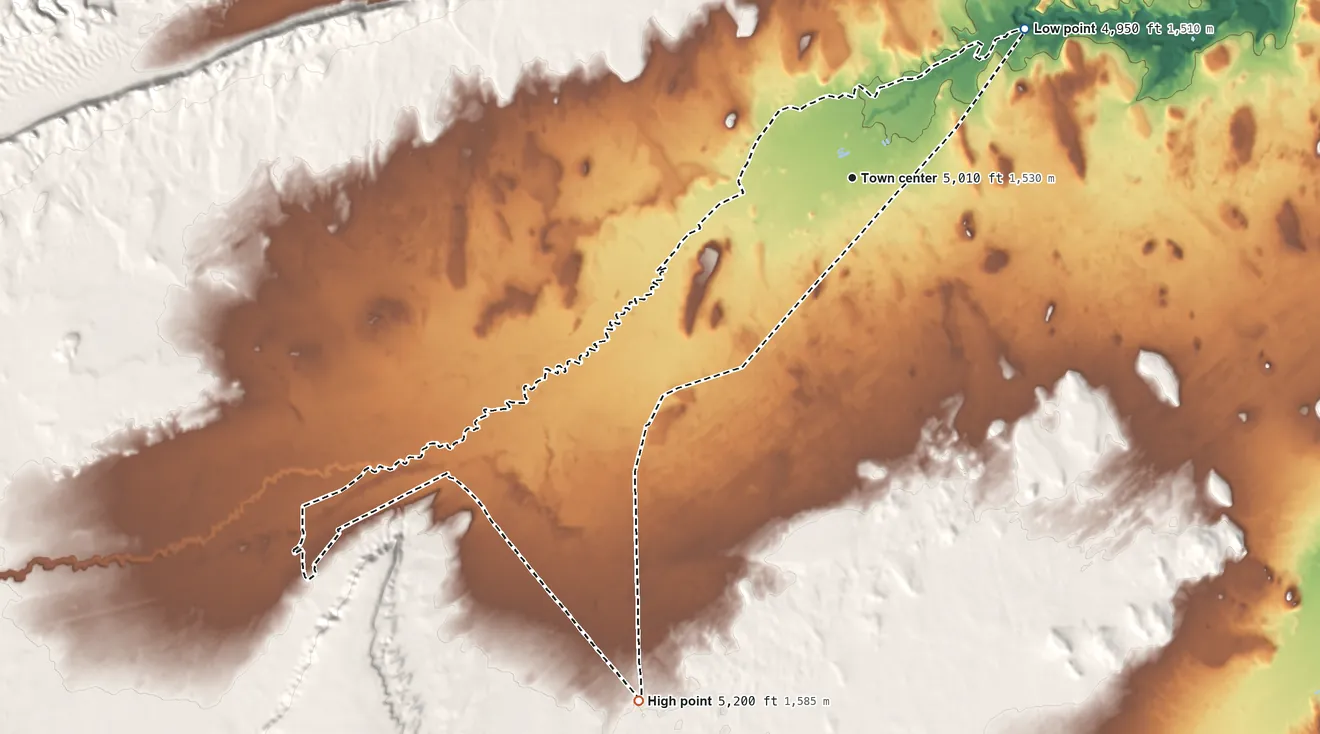 Topographic elevation map of Dennehotso, Arizona, shaded from 4,950 ft on the northeast side to 5,200 ft on the south side