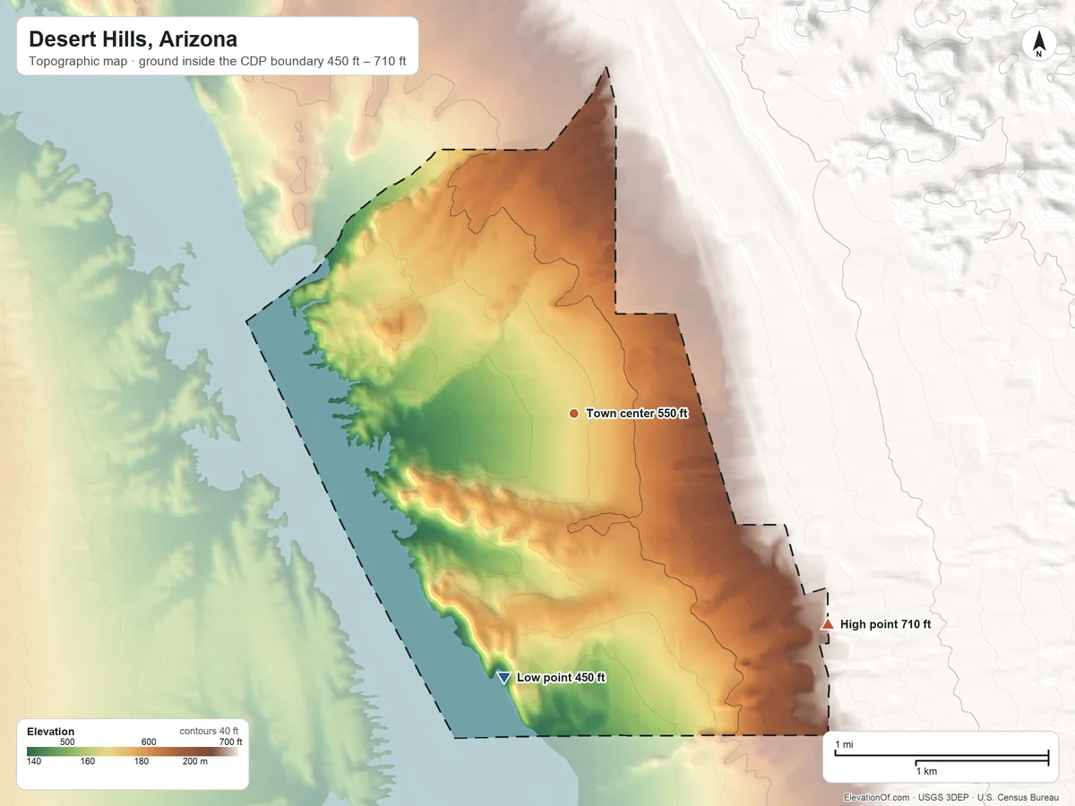 Topographic elevation map of Desert Hills, Arizona, shaded from 450 ft on the south side to 710 ft at the foot of the Mohave Mountains