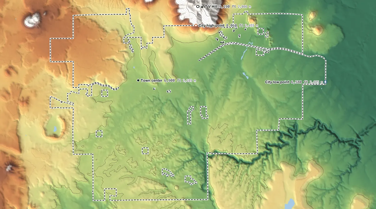 Topographic elevation map of Flagstaff, Arizona, shaded from 6,580 ft on the east side to 8,060 ft at the foot of the White Horse Hills