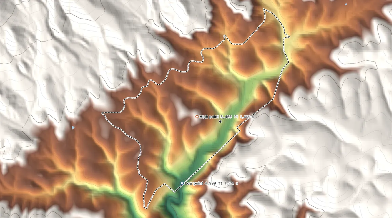 Topographic elevation map of Geronimo Estates, Arizona, shaded from 4,990 ft on the southwest side to 5,460 ft at the foot of the White Hills