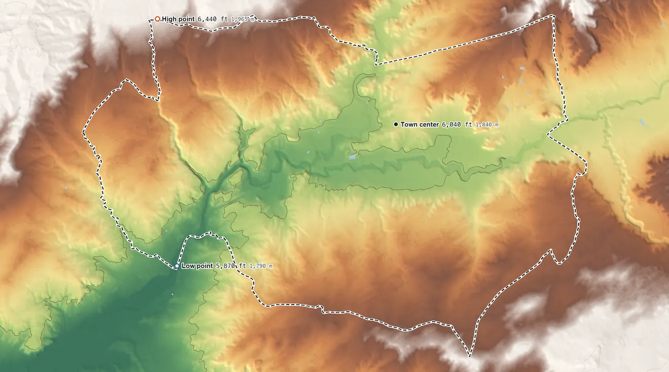 Topographic elevation map of Houck, Arizona, shaded from 5,870 ft on the southwest side to 6,440 ft on the northwest side