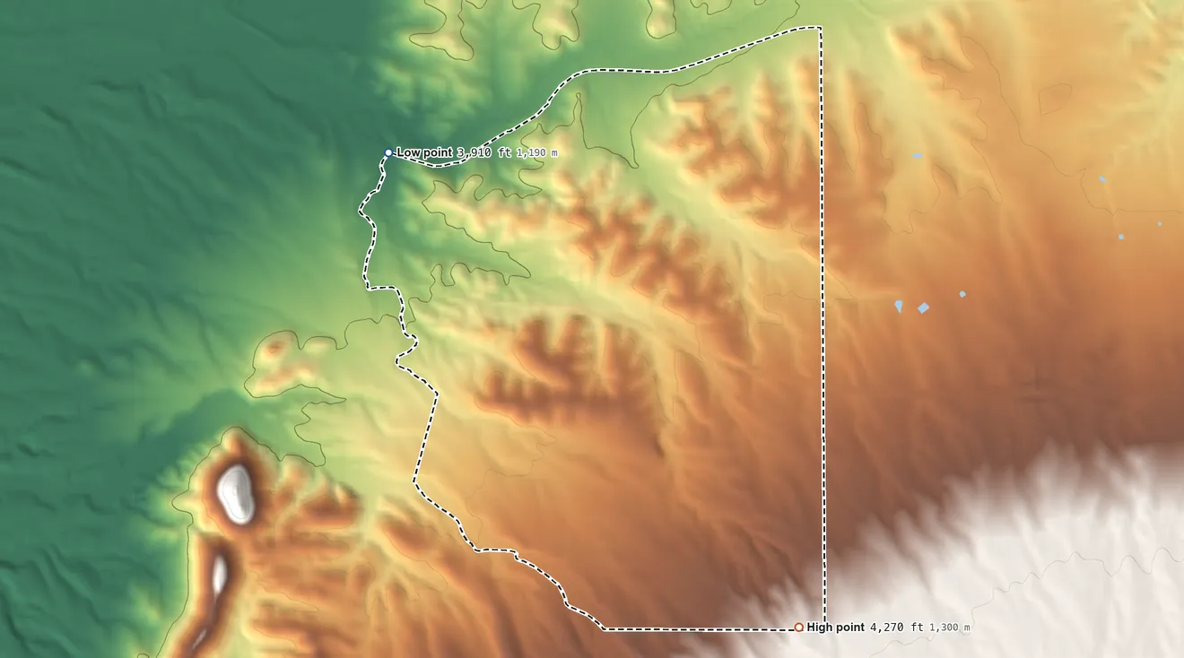 Topographic elevation map of J-Six Ranchettes, Arizona, shaded from 3,910 ft on the northwest side to 4,270 ft on the southeast side