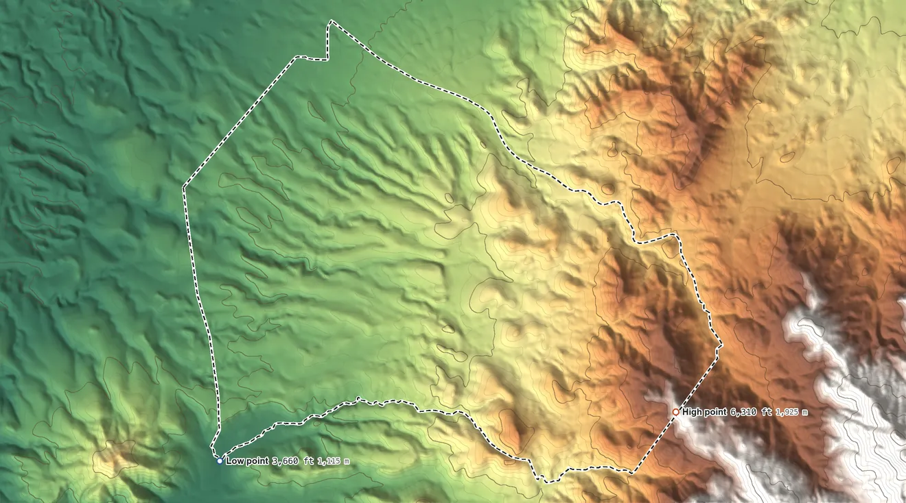 Topographic elevation map of Lazy Y U, Arizona, shaded from 3,660 ft on the southwest side to 6,310 ft at the foot of the Hualapai Mountains