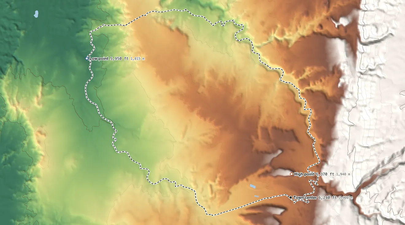 Topographic elevation map of Nazlini, Arizona, shaded from 5,950 ft on the northwest side to 6,370 ft on the north edge, below higher ground just outside