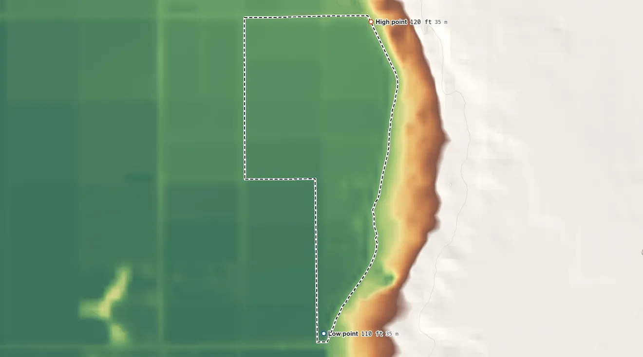 Topographic elevation map of Padre Ranchitos, Arizona, shaded from 110 ft on the south side to 120 ft on the northeast side