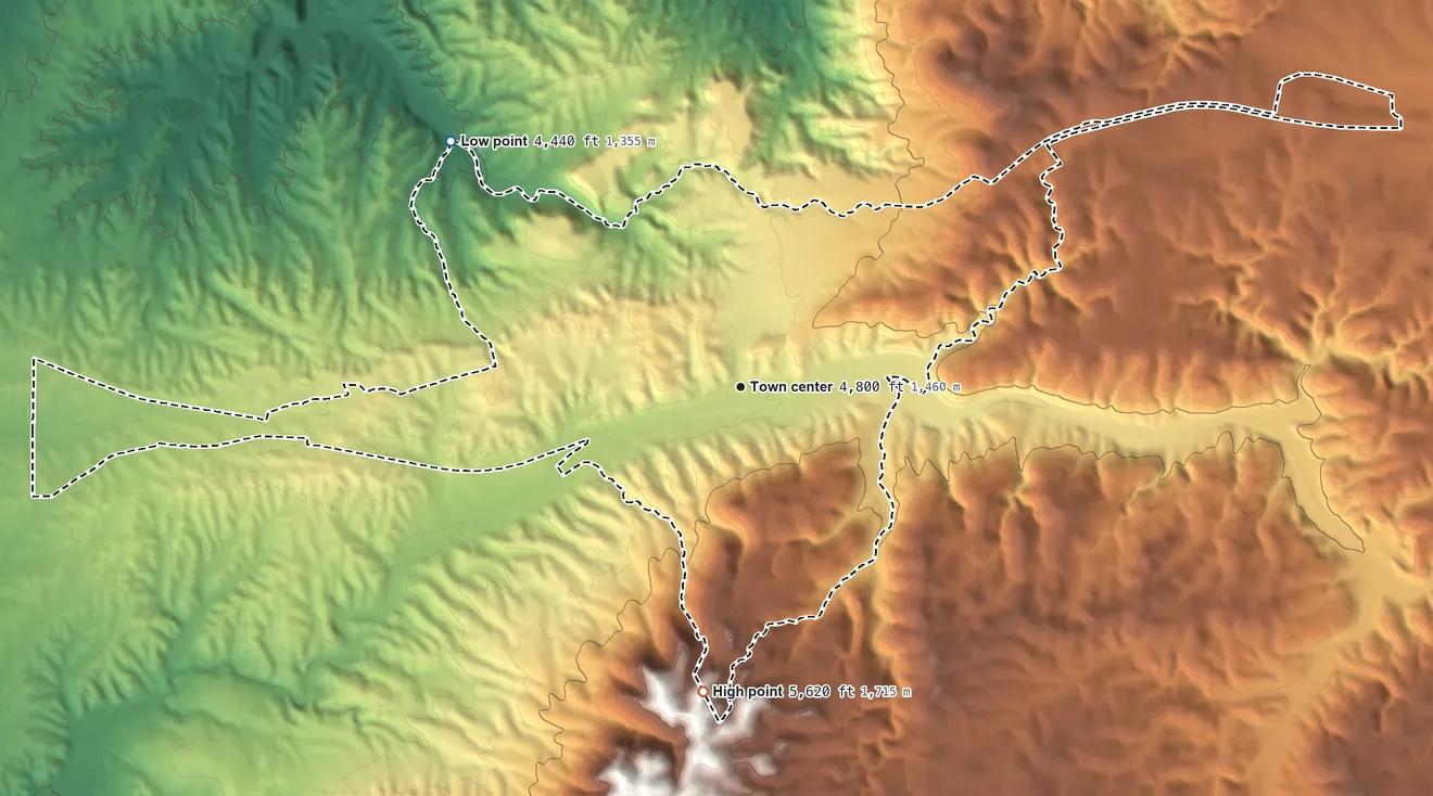 Topographic elevation map of Peach Springs, Arizona, shaded from 4,440 ft on the northwest side to 5,620 ft on the south side