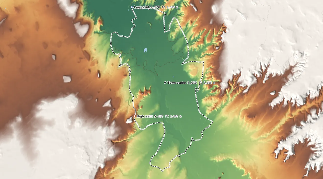 Topographic elevation map of Rock Point, Arizona, shaded from 4,970 ft on the northwest side to 5,450 ft on the southwest side